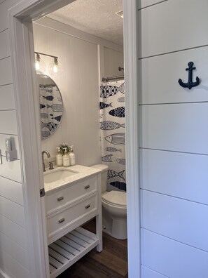 Hair dryer, towels, soap, shampoo