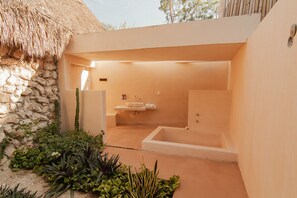 Premier Room | Bathroom | Shower, rainfall showerhead, eco-friendly toiletries, bathrobes