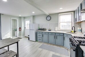 Fridge, microwave, stovetop, coffee/tea maker