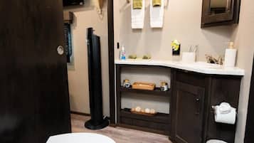 Shower, hair dryer, towels, soap