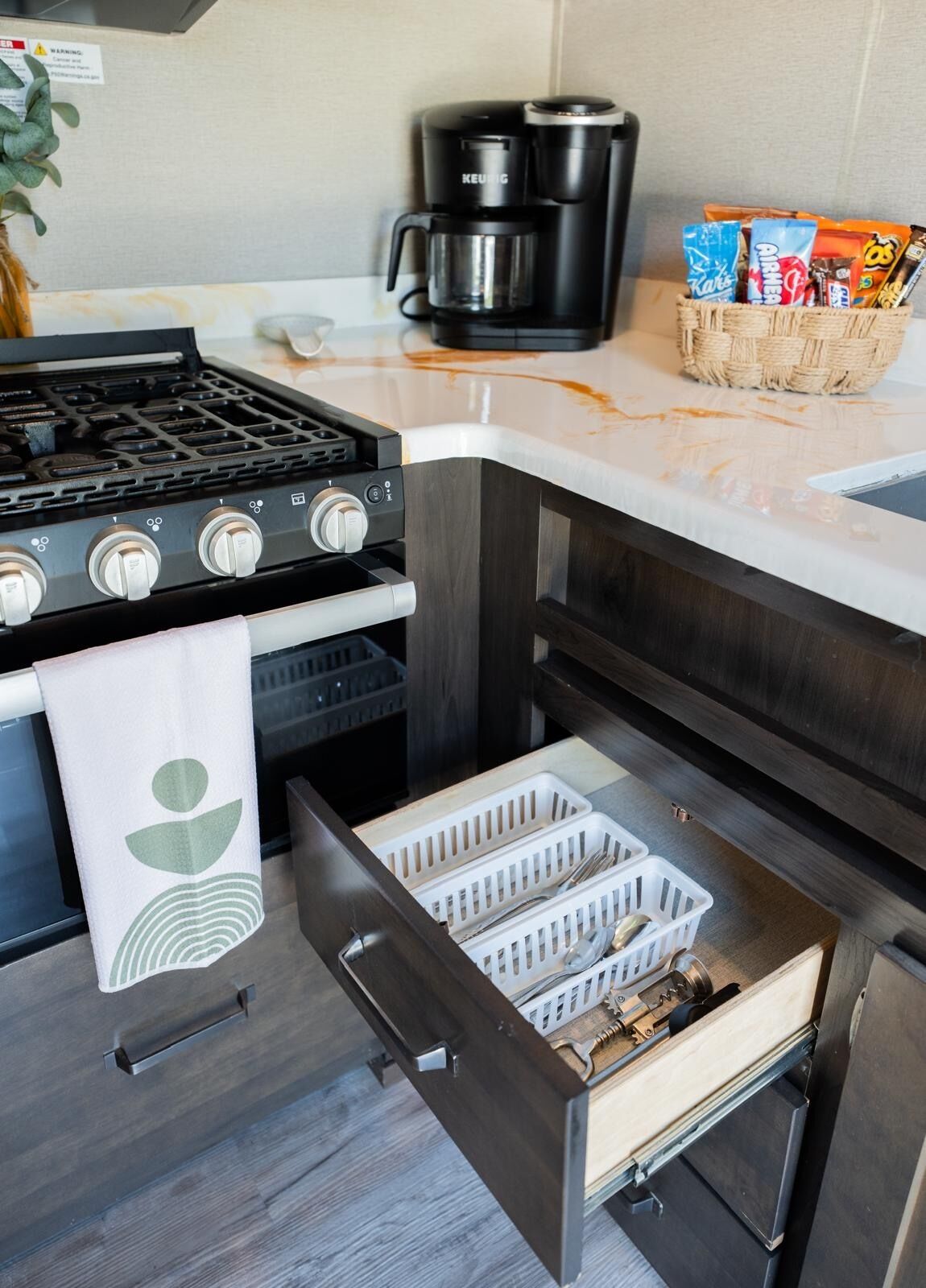 Fridge, microwave, coffee/tea maker, cookware/dishes/utensils
