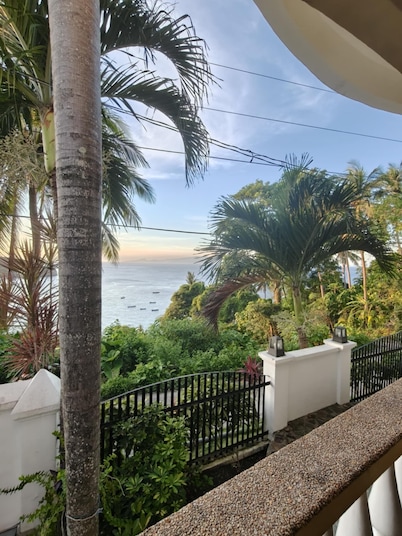 studio apartment with ocean views and swimming pool .