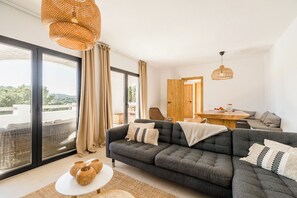 TV, fireplace - Casa Zita Mar - Ibiza style villa, beach nearby & magical view (Cala Llonga)