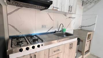 Design Studio, 1 Double Bed, City View | Private kitchen | Full-size fridge, microwave, rice cooker, blender