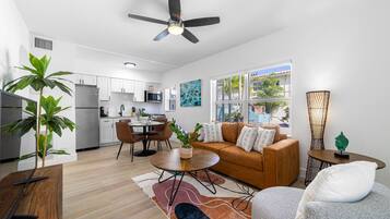 Deluxe Apartment | Living area | 55-inch Smart TV with digital channels, TV, Netflix