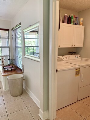 Combined shower/tub, hair dryer, towels, soap