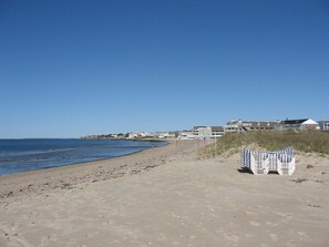 On the beach, sun-loungers