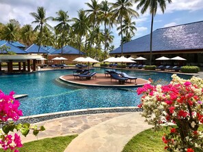 Outdoor pool, open 7:00 AM to 10:00 PM, pool umbrellas, sun loungers - Sundancer Residences & Villas Lombok (Sekotong Barat)