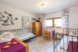 3 bedrooms, desk, iron/ironing board, travel cot