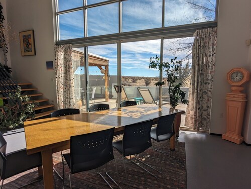 Light-filled main house close to town; views, hiking on high desert behind house