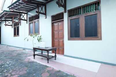 SPOT ON 92068 Pudja Kesuma Homestay Syariah Yogyakarta的聚点