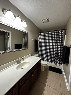 Hair dryer, towels, soap, shampoo