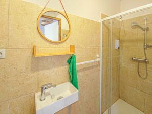 Shower, towels, soap, toilet paper