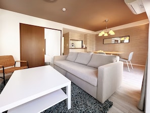 Design Double Room | Living area | Flat-screen TV