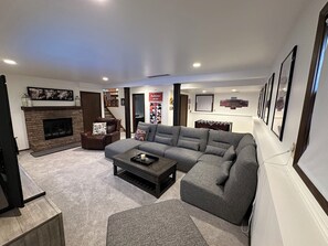 Smart TV, fireplace, foosball