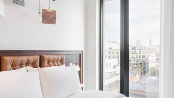 Hypo-allergenic bedding, in-room safe, desk, laptop workspace