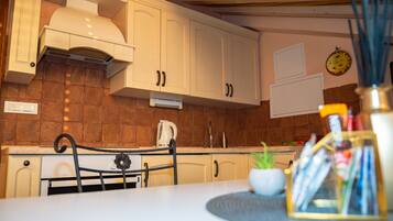 Family Studio Suite | 1 bedroom, in-room safe, blackout drapes, iron/ironing board