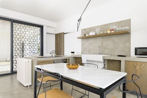 Villa | Private kitchen | Fridge, microwave, oven, stovetop
