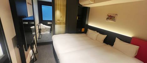 Kamar Double atau Twin Basic | Selimut bulu angsa, meja kerja, kedap suara, dan Wi-Fi gratis