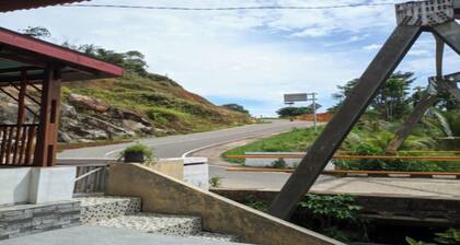 EXPRESS O 91702 Mandeh Homestay Syariah Near Bank Nagari PT Bank Pembangunan Daerah (BPD) Sumbar Cabang Painan