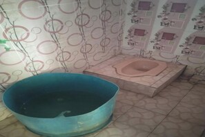 Deluxe Double Room | Bathroom | Shower, towels - EXPRESS O 91702 Mandeh Homestay Syariah Near Bank Nagari PT Bank Pembangunan Daerah (BPD) Sumbar Cabang Painan (Painan)