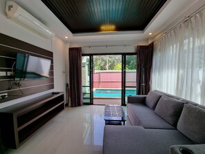 Family Villa | Living area | 40-inch Smart TV with cable channels, TV - Baan Gipper Private Pool Villa  (Krabi)