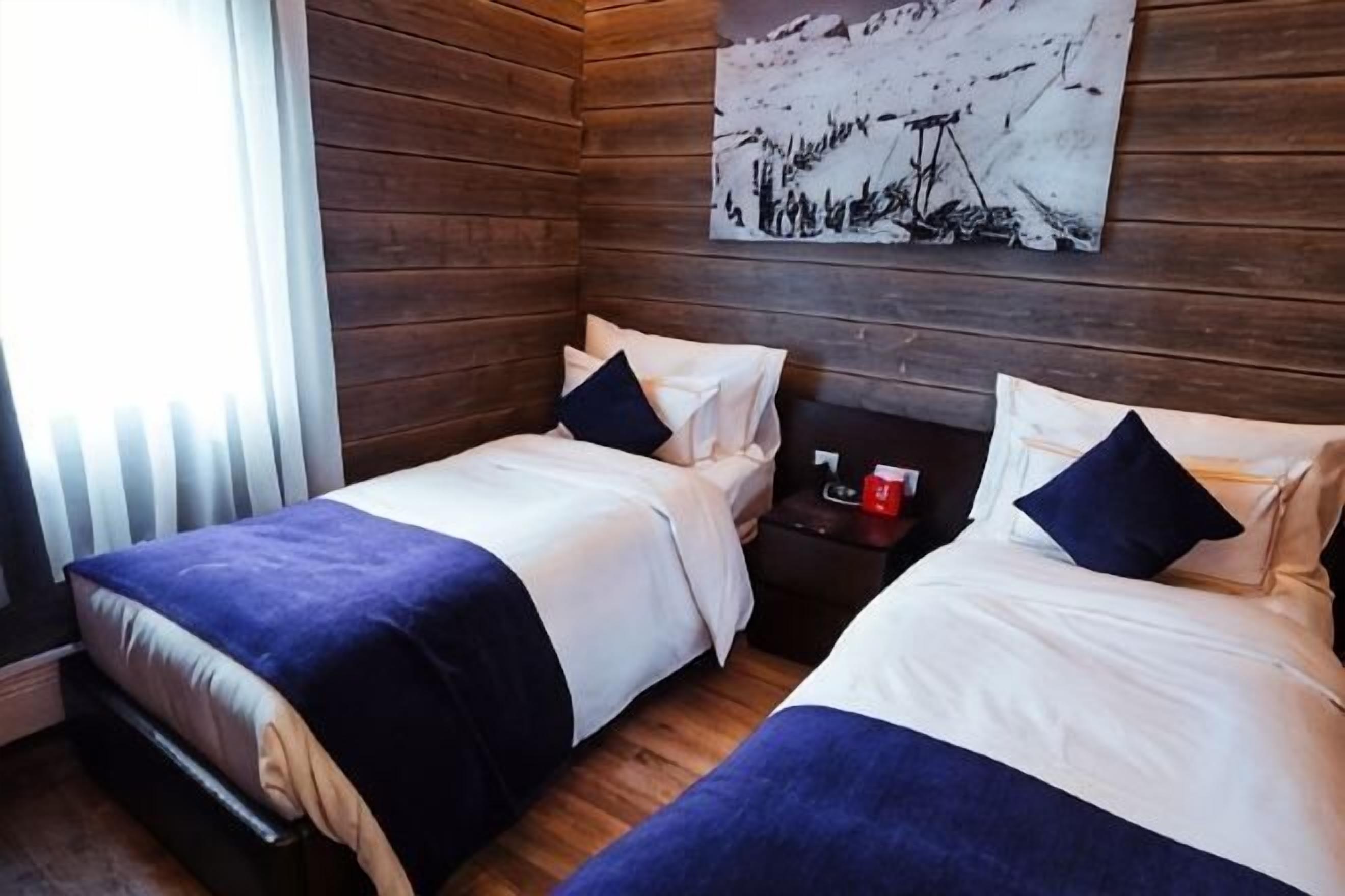 Premium bedding, pillow-top beds, minibar, in-room safe