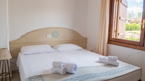 2 habitaciones, tabla de planchar con plancha y ropa de cama 