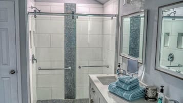 Shower, hair dryer, towels, soap