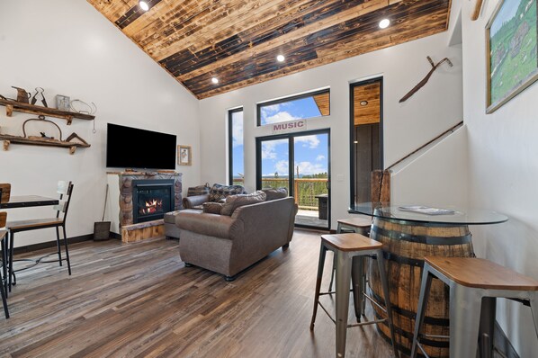 Smart TV, fireplace, video games, foosball - Spacious Mountain Retreat with Hot-tub, Firepit, Game Room, 360 views, Stunning Views and Studio (Lead)