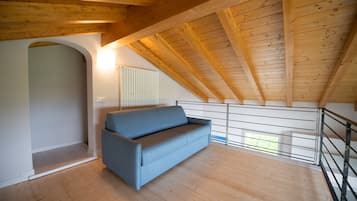 Comfort Apartment, 2 Bedrooms | Living area | 20-inch TV with digital channels