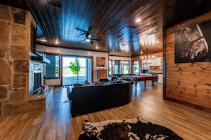 Game room - The Clubhouse is a refined sanctuary where celebration and rest coexist effortlessly. A grand lodge designed for gatherings, it welcomes weddings beneath soft lights, laughter by the fire, and mornings that unfold slowly. (BROKEN BOW)