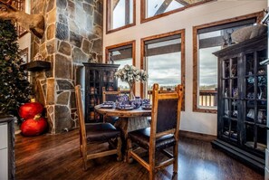 Dining - The Clubhouse is a refined sanctuary where celebration and rest coexist effortlessly. A grand lodge designed for gatherings, it welcomes weddings beneath soft lights, laughter by the fire, and mornings that unfold slowly. (BROKEN BOW)
