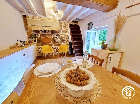 Dining. Charming 2-Person Cottage with Garden & Shared Amenities in Montenay