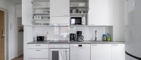 Fridge, microwave, stovetop, coffee/tea maker