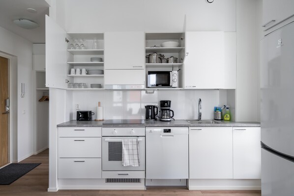 Fridge, microwave, stovetop, coffee/tea maker