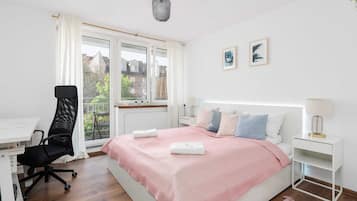 1 bedroom, desk, iron/ironing board, travel crib