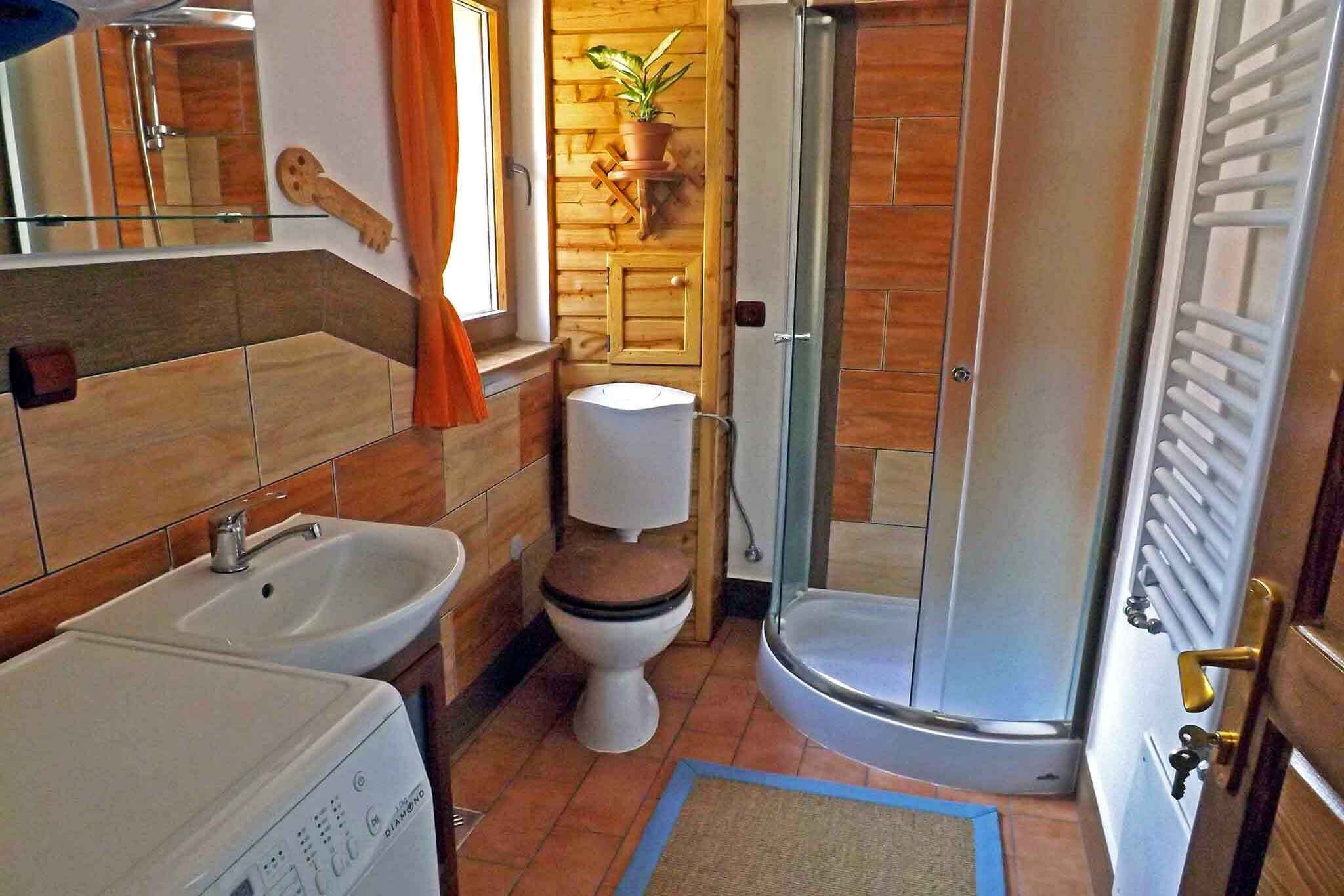 Design Studio | Bathroom | Shower, hair dryer, slippers, towels