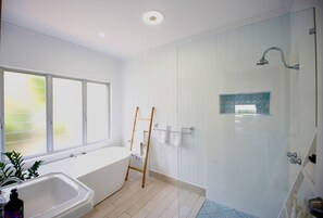 Shower, hair dryer, towels, soap