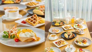 A breakfast buffet with various dishes including waffles, eggs, and salads. - The Riski Hotel at Bangphlat Station (Bangkok)