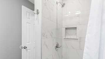 A spacious bathroom with everything you need to feel refreshed and rejuvenated.