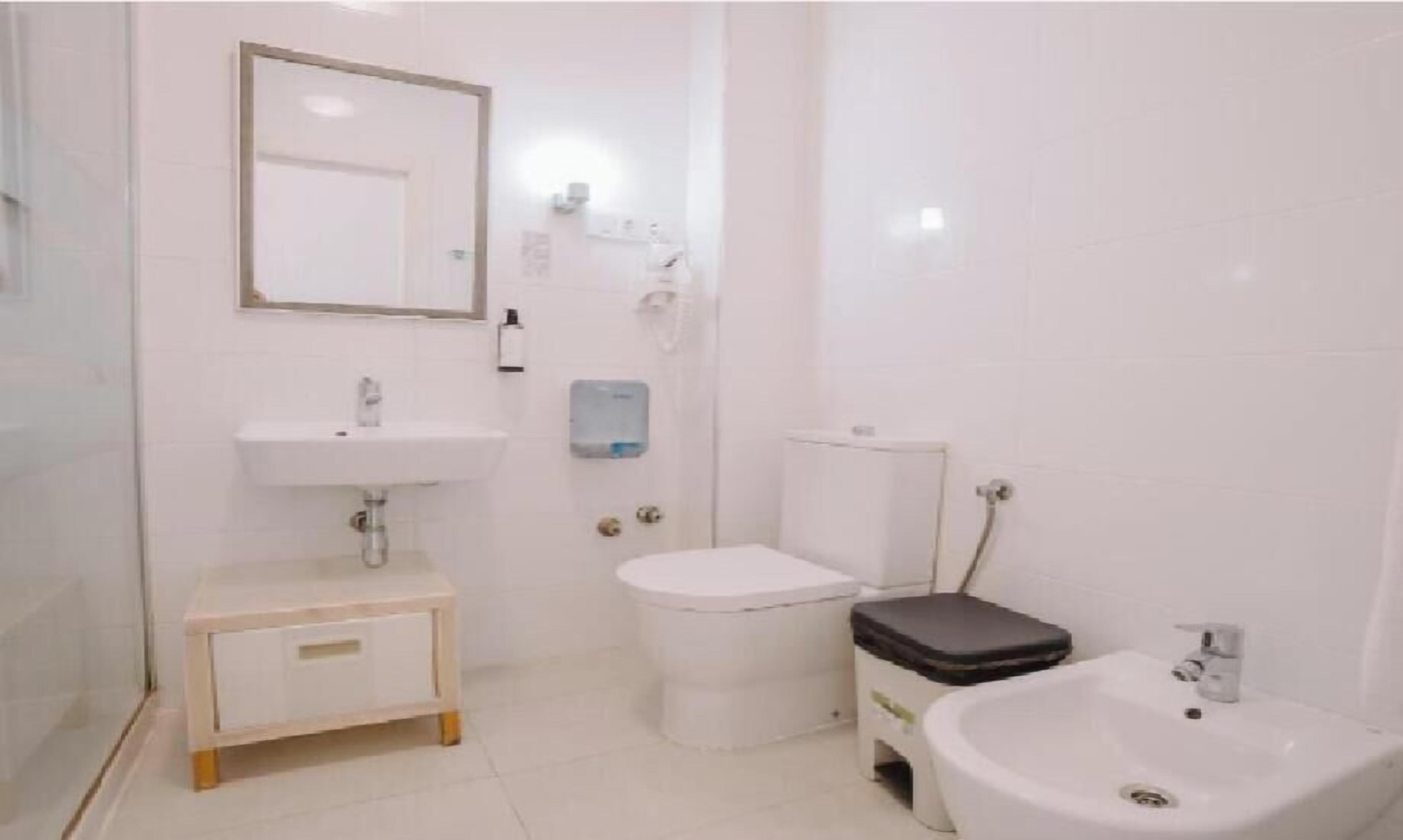 Bathroom | Hair dryer, bidet, towels