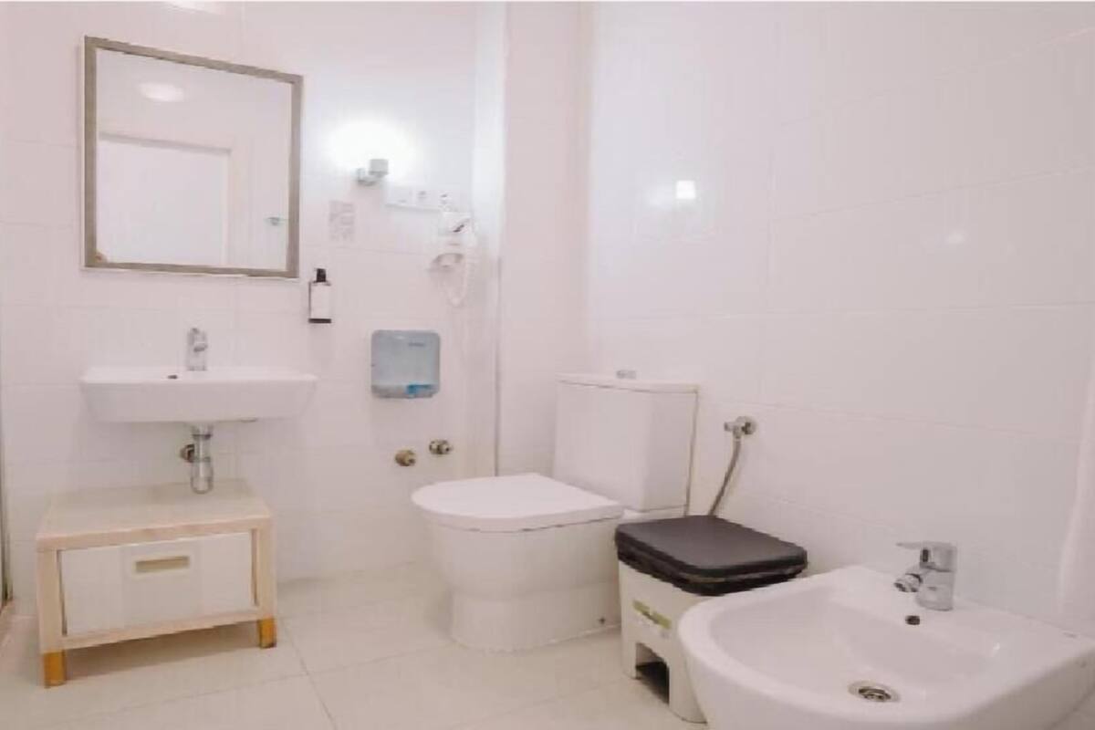 Bathroom | Hair dryer, bidet, towels