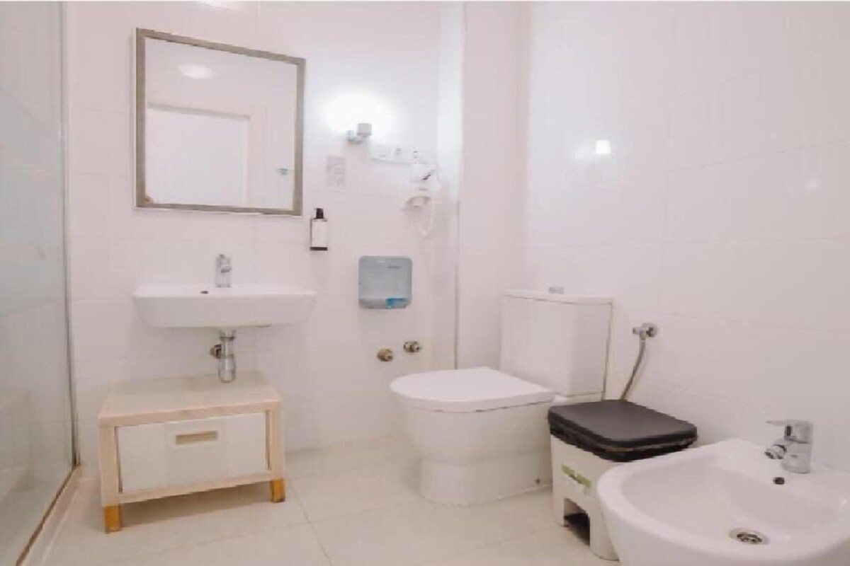 Baño | Secador de pelo, bidé y toallas