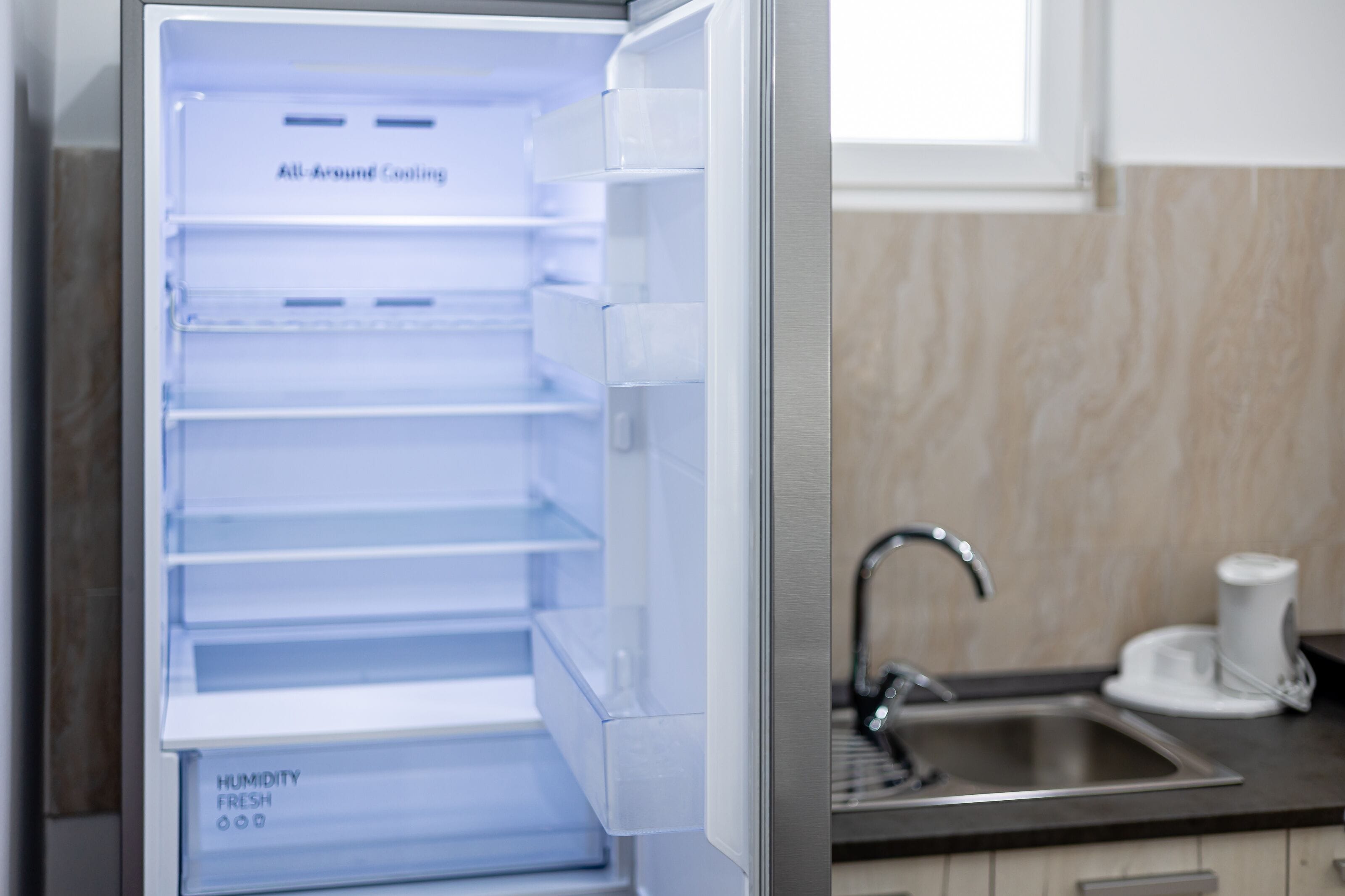 superior apartment | private kitchen | electric kettle, cleaning supplies