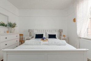 2 chambres, fer et planche à repasser, Wi-Fi, draps fournis