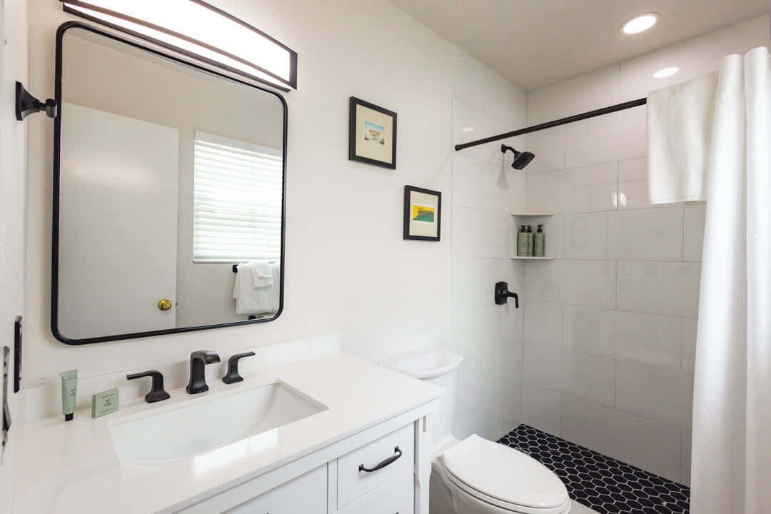 Bathtub, hair dryer, towels