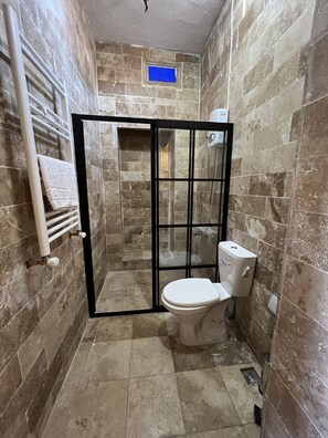 Standard Double Room, 1 Large Twin Bed | Bathroom | Shower, hair dryer, towels