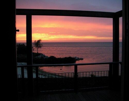 Luxury Beach Villa with balcony, terrace, fireplace, and panoramic IJsselmeer views at Beach Resort Makkum.