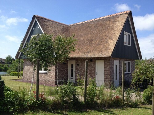 Detached Beachvilla with a large yard, two bathrooms, and the option for a location on the open water at Beach Resort Makkum.